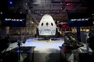 SpaceX's Dragon V2 spacecraft, one of the prime contenders for the NASA contract at its unveiling ceremony in May 2014.