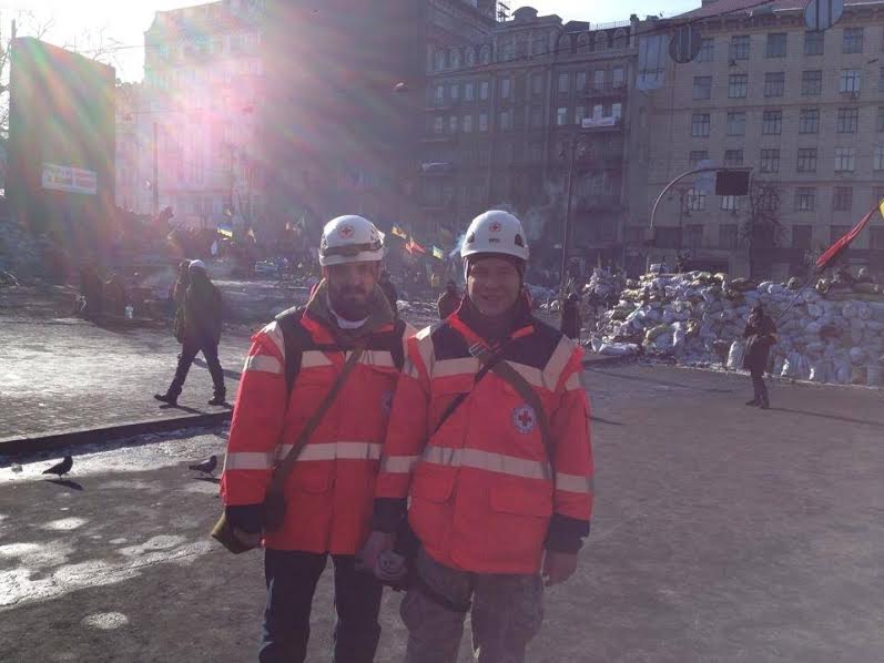 February 2014, Hrushevsky Street, Kyiv, Ukraine. Roman (left) patrolling the Maidan with his close friend Maxim Popov (right). They have known each other for a long time and met again having joined the Red Cross. Maxim Popov was the one who saved injured Roman