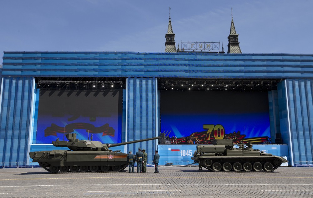 The state-of-the art Russian T-14 Armata tank stalled in the middle of the Red Square during a preparation for general rehearsal for the Victory Day military parade, would not restart, and had to be towed. Moscow, Russia, Thursday, May 7, 2015. (AP Photo/Alexander Zemlianichenko)