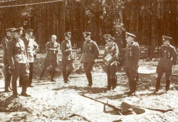 Hitler with German officers at the Werwolf, a German military HQ located outside Vinnytsia. It was the easternmost of his HQs and was built by using Ukrainians and Soviet POWs as forced labour. After its completion, those who built it were executed to protect the bunkers secrecy. It was destroyed in March 1944 to prevent it being used by the approaching Red Army.