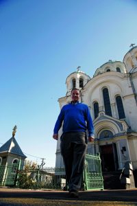 Michel Tereshchenko in front of the Cathedral of Three Anastasias in Hlukhiv