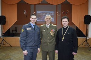 Police Leutenant Mishkel (left) and Archpries Yevgeny Pavelchuk, founders of the Russian "military-patriotic clubs" called the Slaviane and the Druzhina.