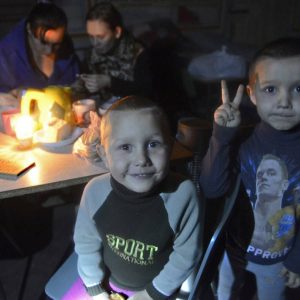Families with children in a bomb shelter in Donetsk hiding from artillery shelling as result of the Russian military aggression in the Donbas, Ukraine (Image: A. Umanets / Segodnya.ua)
