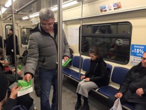 Boris Nemtsov on the metro handing out flyers for upcoming "Spring" Anti-Crisis March, Feb 15, 2015 (Source: Facebook)