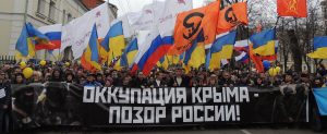 Boris Nemtsov leads Peace March, March 15, 2014. Banner: "Russia's Occupation of Crimea is Shameful" (Source: Facebook)