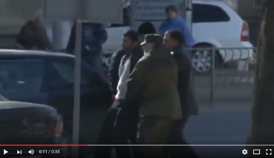 Snapshot from video where Crimean "self-defense" forces abduct Reshat Ametov, who was later found dead