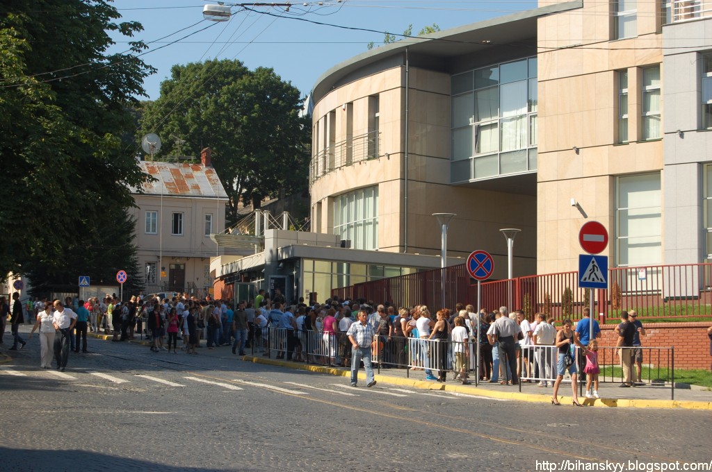 People waiting if a queue to apply for the Schengen visa at the Poland's Consulate in Lviv.