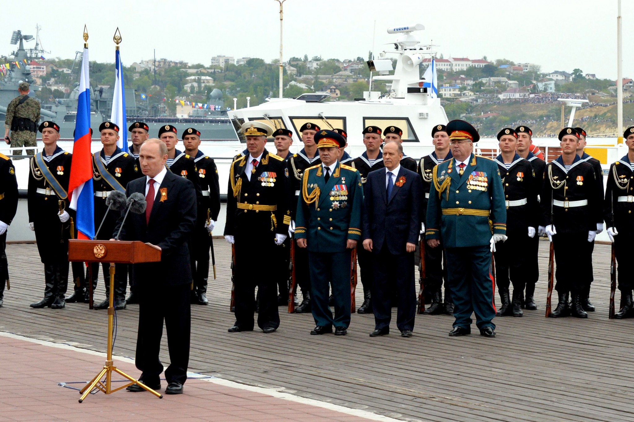 Putin speaking in occupied Sevastopol on the anniversary of the WW2 Victory Day to celebrate the annexation of the Crimean peninsula from Ukraine conducted by his military and special services two months earlier. May 9, 2014 (Image: AFP PHOTO/ YURI KADOBNOVYURI KADOBNOV/AFP/Getty Images)