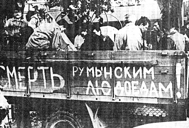 The truck’s body reads, “Death to Romanian man-eaters”. Transnistria, Moldova, 1992.