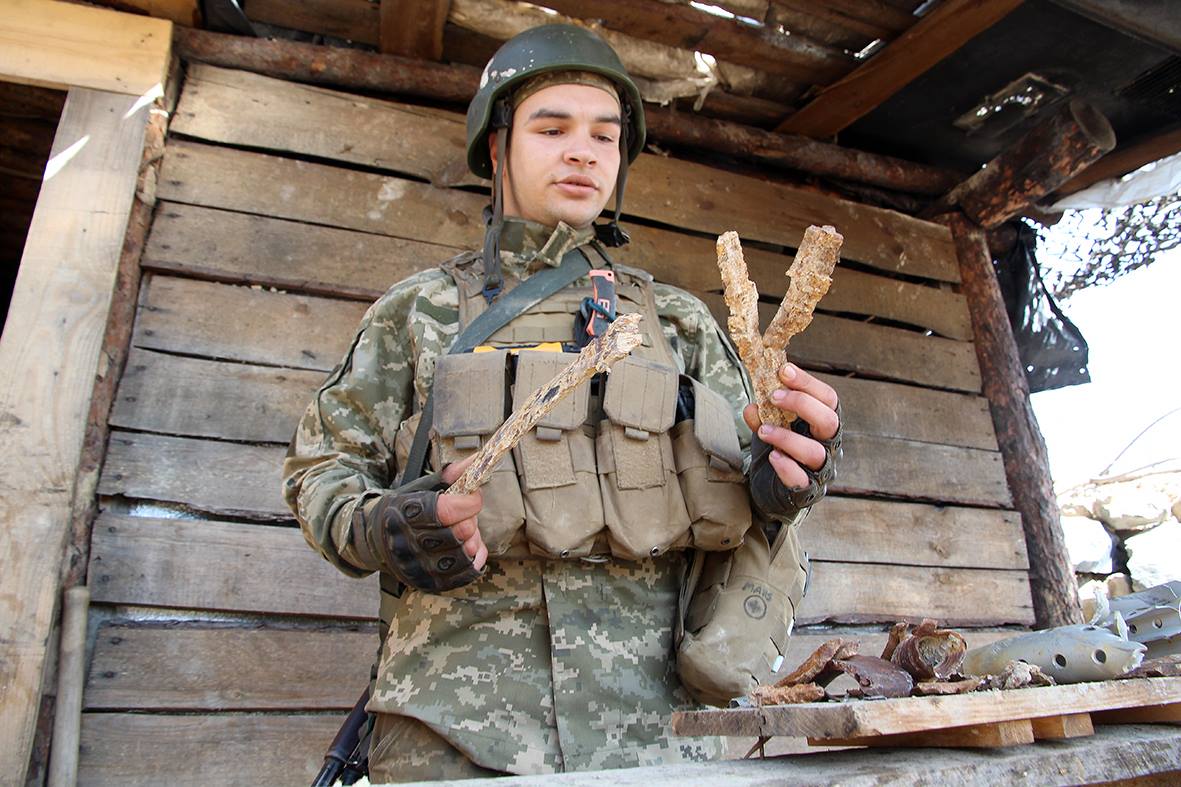 Ukrainian Soldiers In War Zone Display Enemy trophies Gathered After Night AttacksEuromaidan 