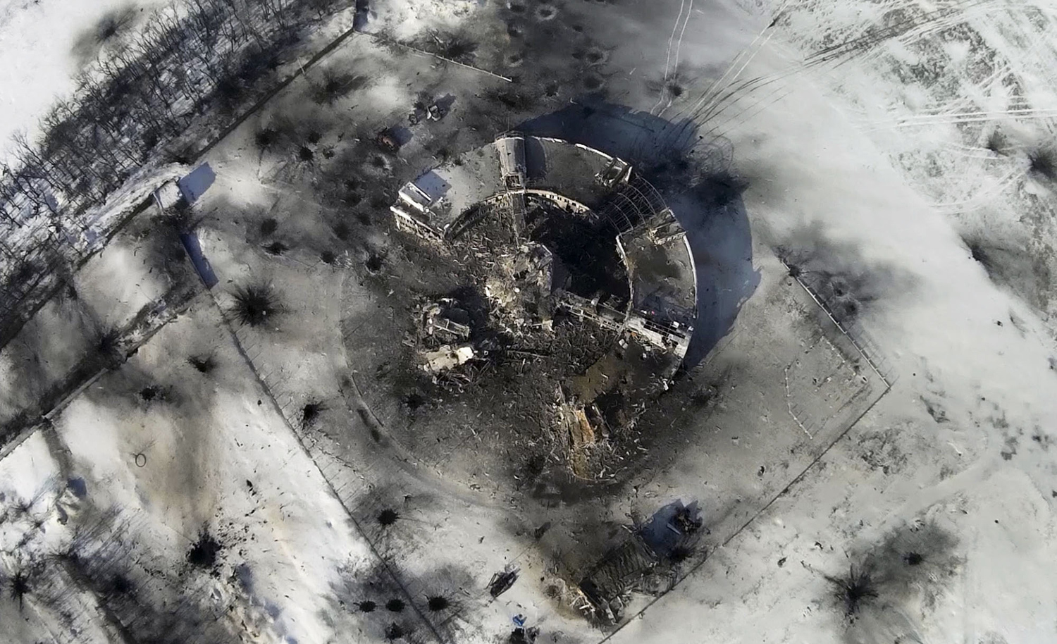 Donetsk Airport: This photo taken by a drone on January 15, 2015 shows the destroyed control tower surrounded by craters and debris at the airport in Donetsk. Photo: ArmySOS, via theatlantic.com