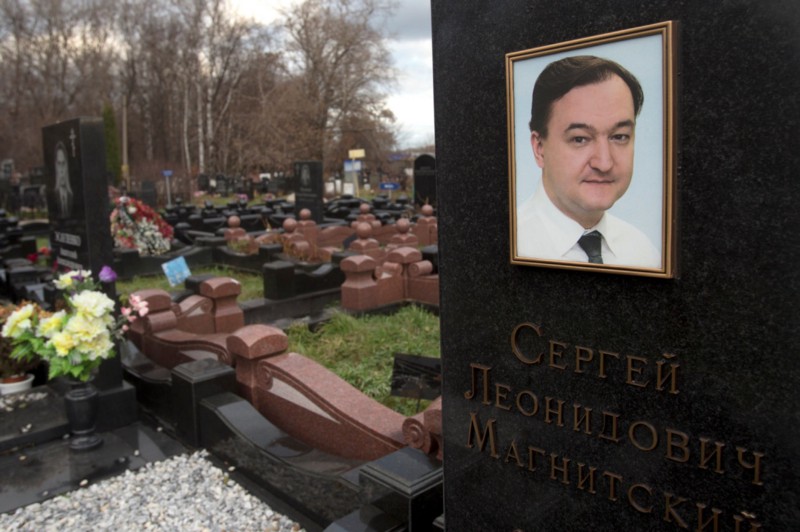 Tombstone of Sergei Magnitsky, Russian lawyer who died in a Moscow prison in 2009 after accusing Russian government of massive corruption/tax fraud scheme. 2012 US law “Magnitsky Act” imposed asset freezes and visa ban sanctions on those responsible US held responsible for his death (photo: Misha Japaridze/AP, via NPR)