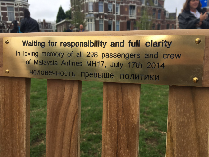 Relatives of MH17 victims installed a bench with this memorial plaque near the Russian embassy in Hague on the eve of the tragedy’s third anniversary. Photo: Jildou van Opzeeland