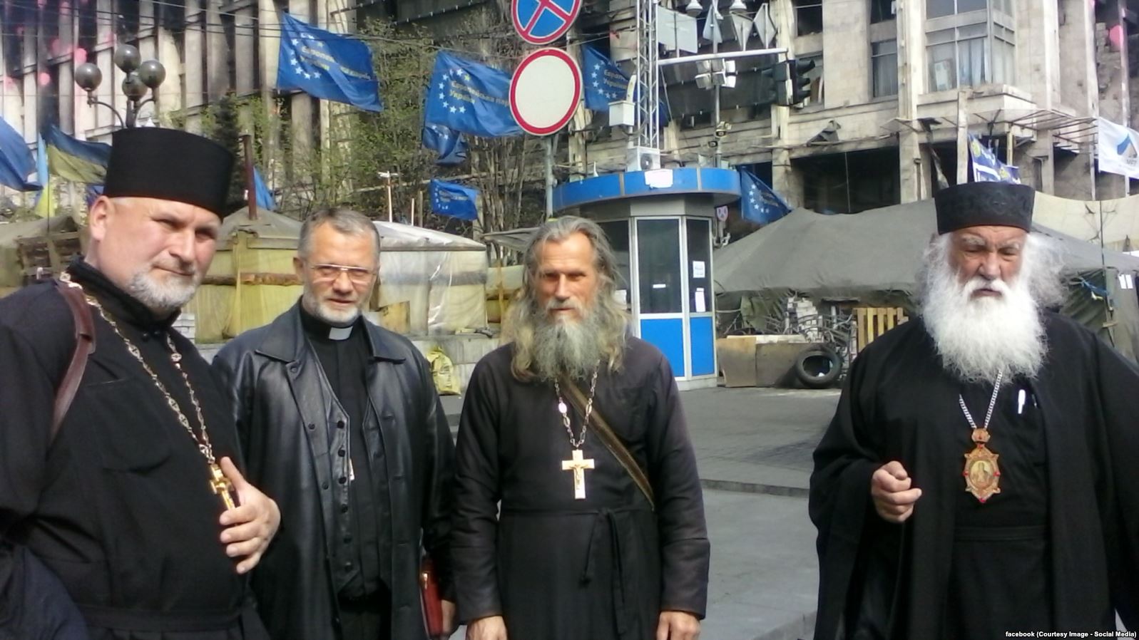 Father Valentyn in the midst of the Euromaidan camp with other priests. Photo: facebook