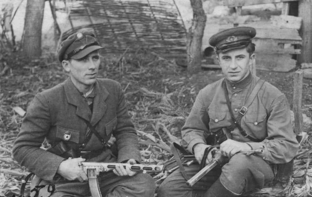 Two soldiers of the Ukrainian Insurgent Army from Bukovyna with captured Soviet and German weapons