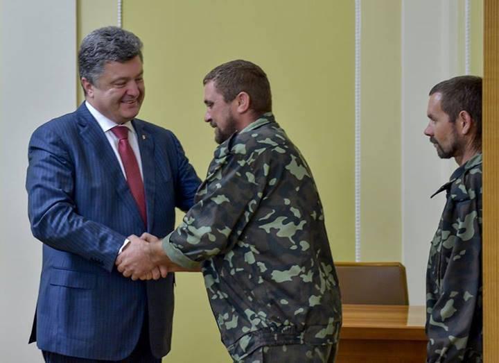Photo from Photogallery of Petro Poroshenko: reception of released hostages by Petro Poroshenko and their meeting with relatives.