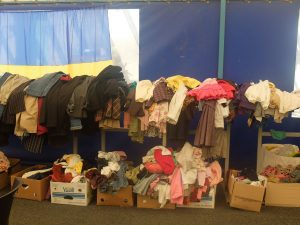Donations of clothes and shoes delivered by volunteers