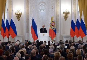 Putin tasking the assembly of Duma deputies, Federation Council members, and the heads of the Russian regions with integration of Crimea into the Russian Federation, March 18, 2014. (Image: Aleksey Nikolskyi/RIAN)