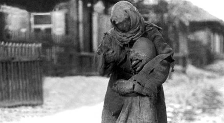 A mother and child, victims of the terror famine in Kazakhstan. Freezing and starving.