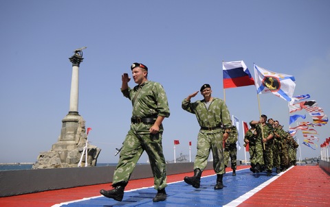 Russian marines march along the embankment of Sevastopol, Crimea, during a celebration of the Navy Day on Sunday, July 26, 2015. (Image: AP Photo/ Alexander Polegenko)