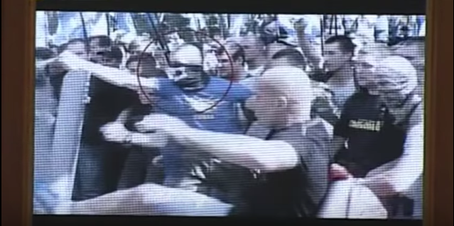 Video of protester pepper spraying a riot policeman