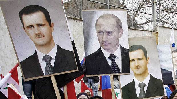 Assad and Putin posters in Syria