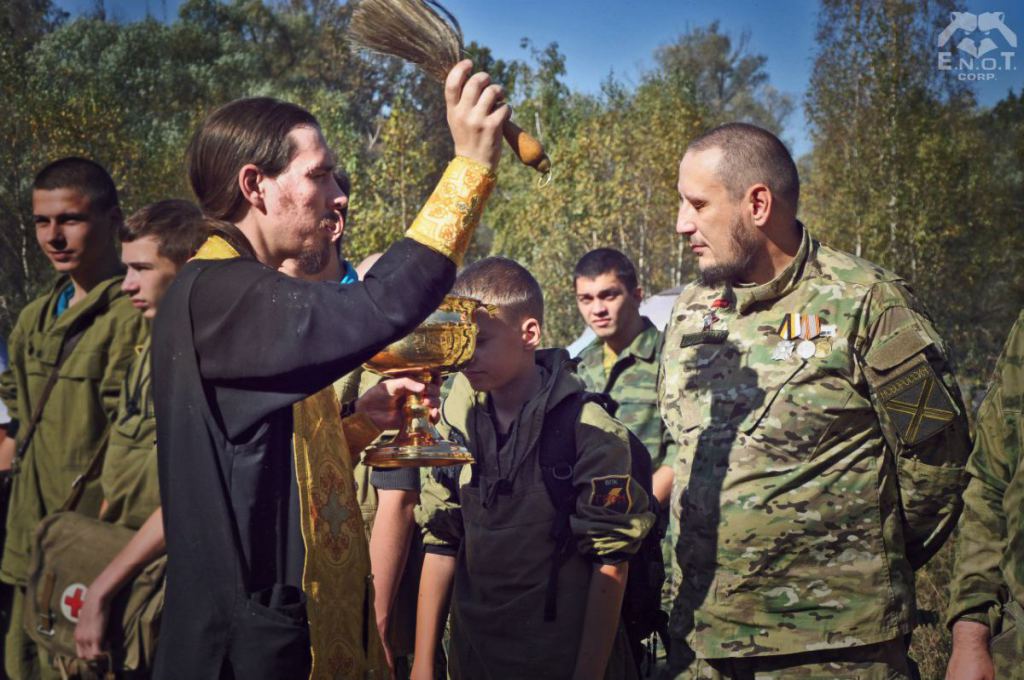 The instructors and trainees of the mercenary camp were "blessed" by a Russian Orthodox monk from the monastery in whose territory the camp is located. Moscow oblast, Russia, September 2015 (Image: ENOT Corp)