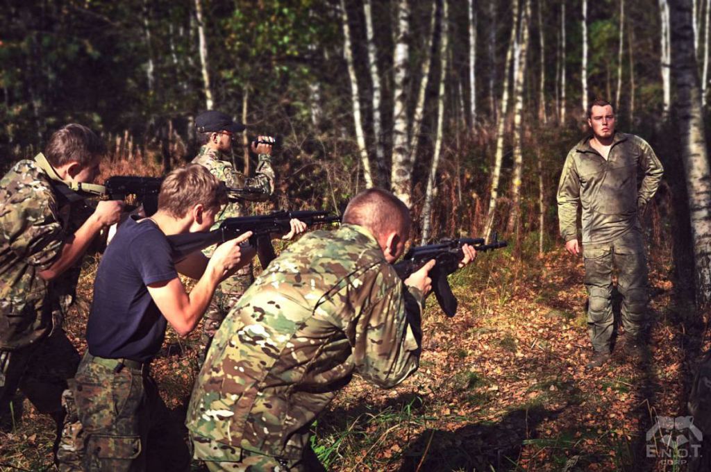 A prominent Russian neo-Nazi Alexey Milchakov (right) instructing at the mercenary camp for Russia's war in Ukraine. Moscow oblast, Russia, September 2015 (Image: ENOT Corp.)