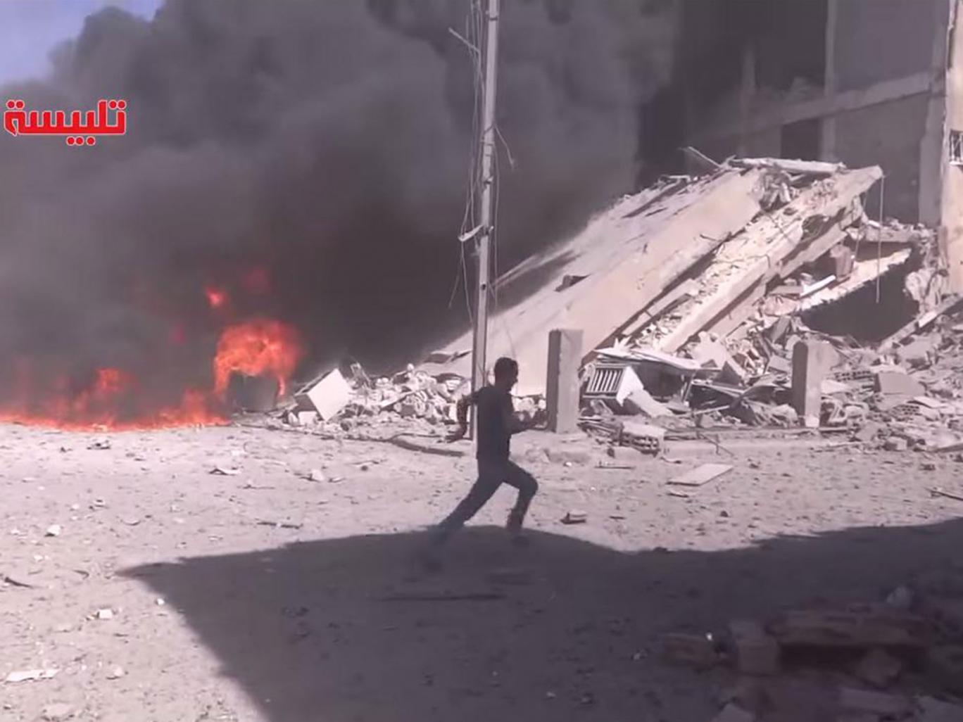 The aftermath of air strikes by a Russian plane in Tabliseh, Syria, on 30 September 2015 YouTube (Image: independent.co.uk)