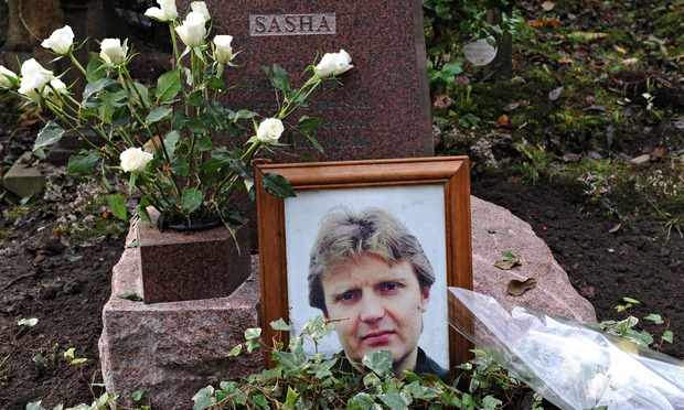 Alexander Litvinenko's grave in Highgate cemetery. In deathbed interviews in hospital with Metropolitan police, he accused Vladimir Putin of personally ordering his murder. The British investigation confirmed his conclusion. (Image: Stefan Rousseau/PA)