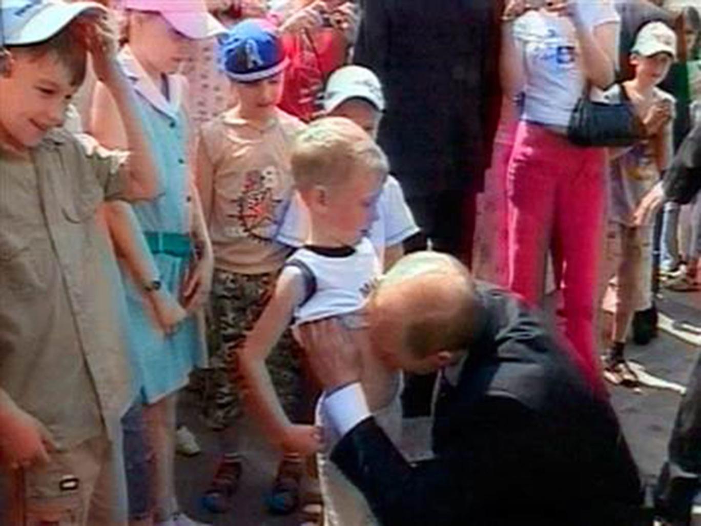 Putin kissing the stomach of Nikita Konkin in 2006. The recent British investigation into the murder of Russian dissident Alexander Litvinenko in London by his former FSB colleagues using a radioactive poison brought to public attention his allegations that Vladimir Putin is a pedophile (Image: AP)