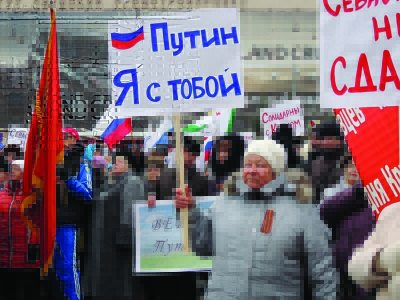 The sign says: "Putin, I am with you"