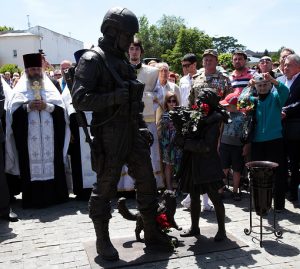 The Russian occupation administration in annexed Crimea erected a monument to Putin's 2014 Anschluss of Crimea by Russia on June 11, 2016 in regional capitol Simferopol. The tens of thousands of so-called "polite people " (also known as "little green men" for their hiding their national origin during the military invasion) were Russian military and special services. (Image: TASS)