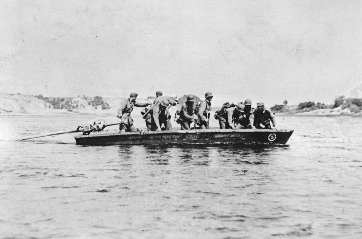 German soldiers cross the Don River in a stormboat, sometime in 1941, during the German invasion of the Caucasus region in the Soviet Union. (Image: AP)