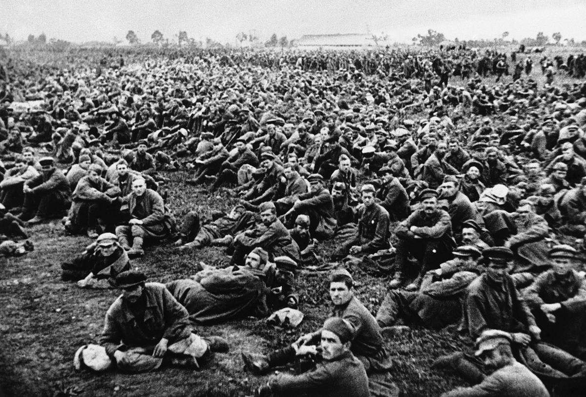 Evidence of the fierce fighting on the Moscow sector of the front is provided in this photo showing what the Germans claim to be some of the 650,000 Soviet prisoners which they captured at Bryansk and Vyasma, Russia. They are here seen waiting to be transported to a prisoner of war camp somewhere in Russia, on November 2, 1941. (Image: AP)