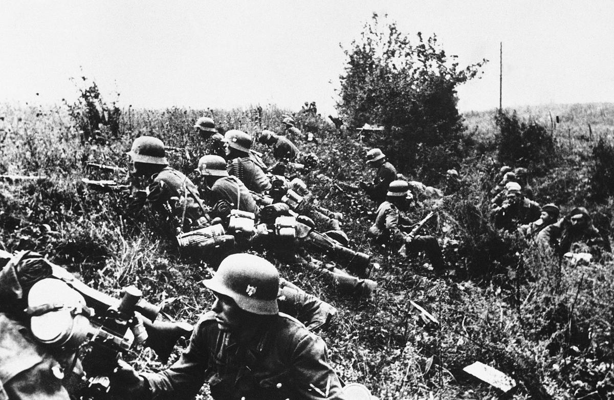 Nazi troops lie concealed in the undergrowth during the fighting prior to the capture of Kyiv, Ukraine, in 1941. (Image: AP Photo)