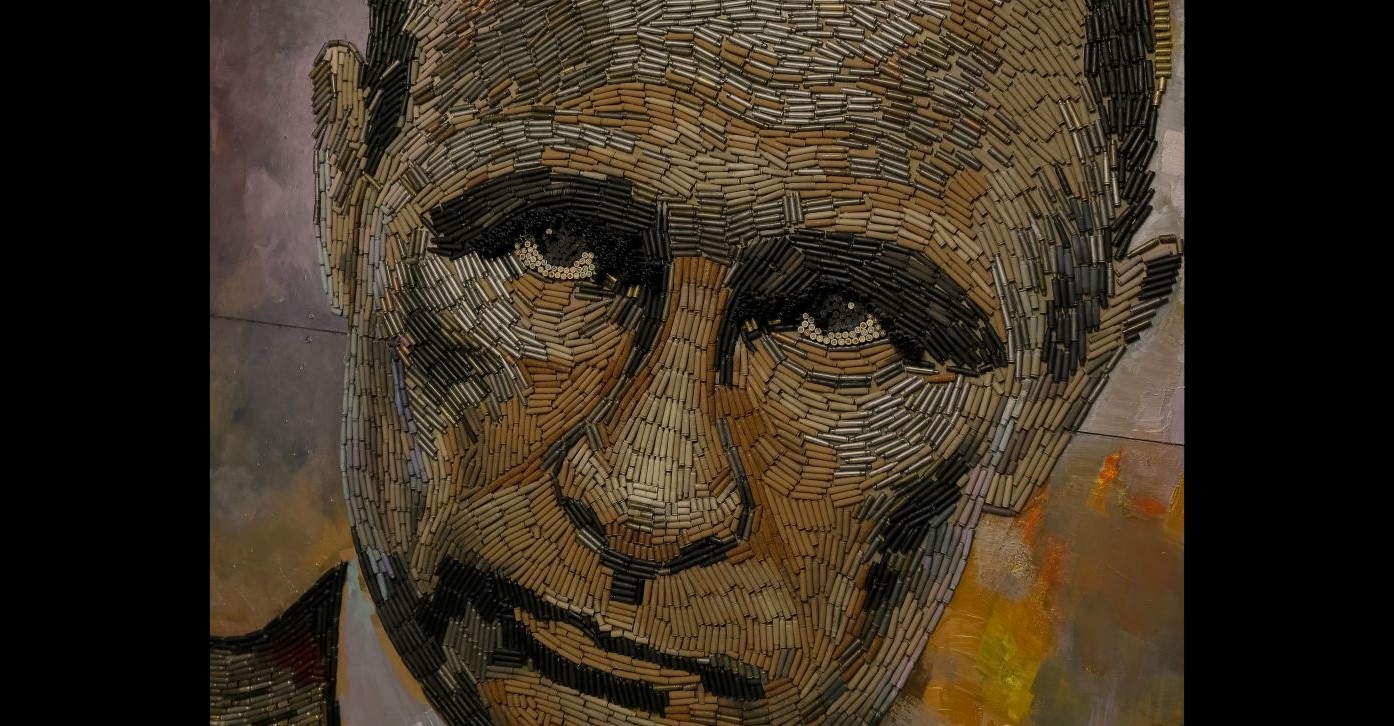 A portrait of Russian President Vladimir Putin by Ukrainian artist Darya Marchenko is made from 5,000 used bullet cartridges collected at the Russo-Ukrainian front in eastern Ukraine. The portrait is named "The Face of War." The portrait was presented along with a novel which tells personal stories of six people involved in this project including Darya's own story and stories of people who helped her to collect the bullet shells at the frontline. She calls her art approach philosophic symbolism where every element has its hidden meaning. In her works each used bullet cartridge stands for a human life that was brutally ended by Putin's military invasion into Ukraine. (Image: dashart.com.ua)