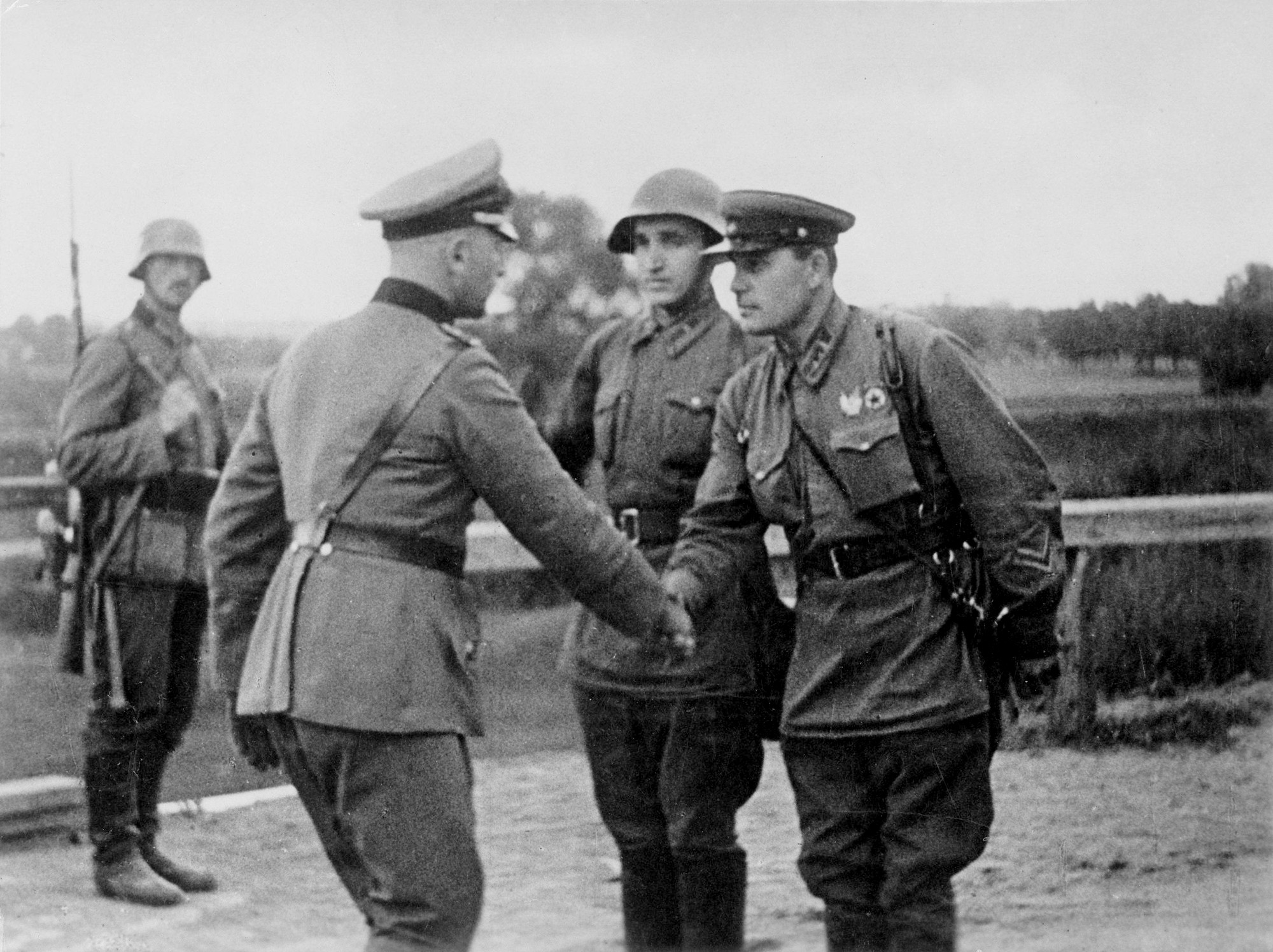 German and Soviet commanders meet at the Nazi-Soviet demarcation line in Poland, after a successful invasion, September 1939