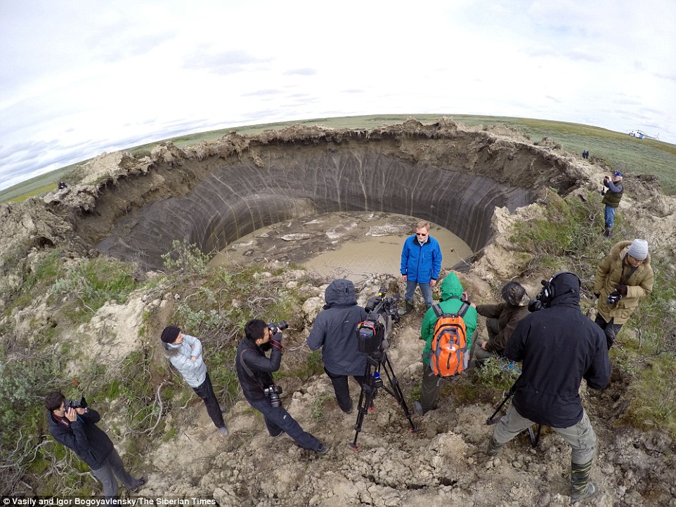 The mysterious giant craters that caused a minor media sensation after they started to appear in the Russian Far North a few years ago have also been tied to effects of the melting permafrost (Image: Vasily and Igor Bogoyavlensky, The Siberian Times)