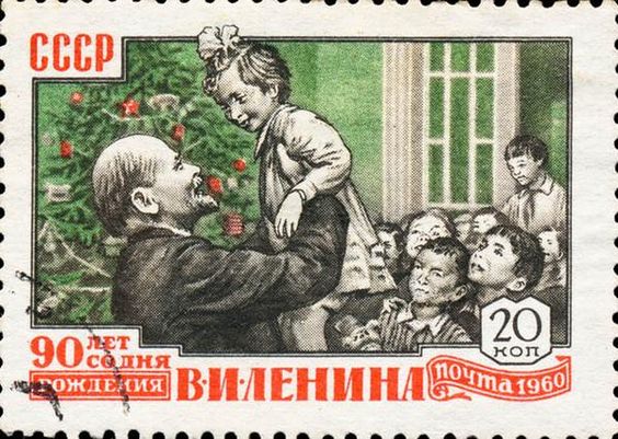 This Soviet stamp is another example of falsifications by the Soviet state propaganda machine. Under the Marxist-Leninist doctrine of state atheism in the Soviet Union, after its foundation in 1917, Christmas celebrations—along with other religious holidays—were prohibited as a result of the Soviet anti-religious campaign. It took 20 years, before the Soviet communists supplanted the tradition of the Christmas tree by the New Year's tree (in 1937), meanwhile the founder of the Soviet Union Vladimir Lenin died thirteen years earlier (in 1924).