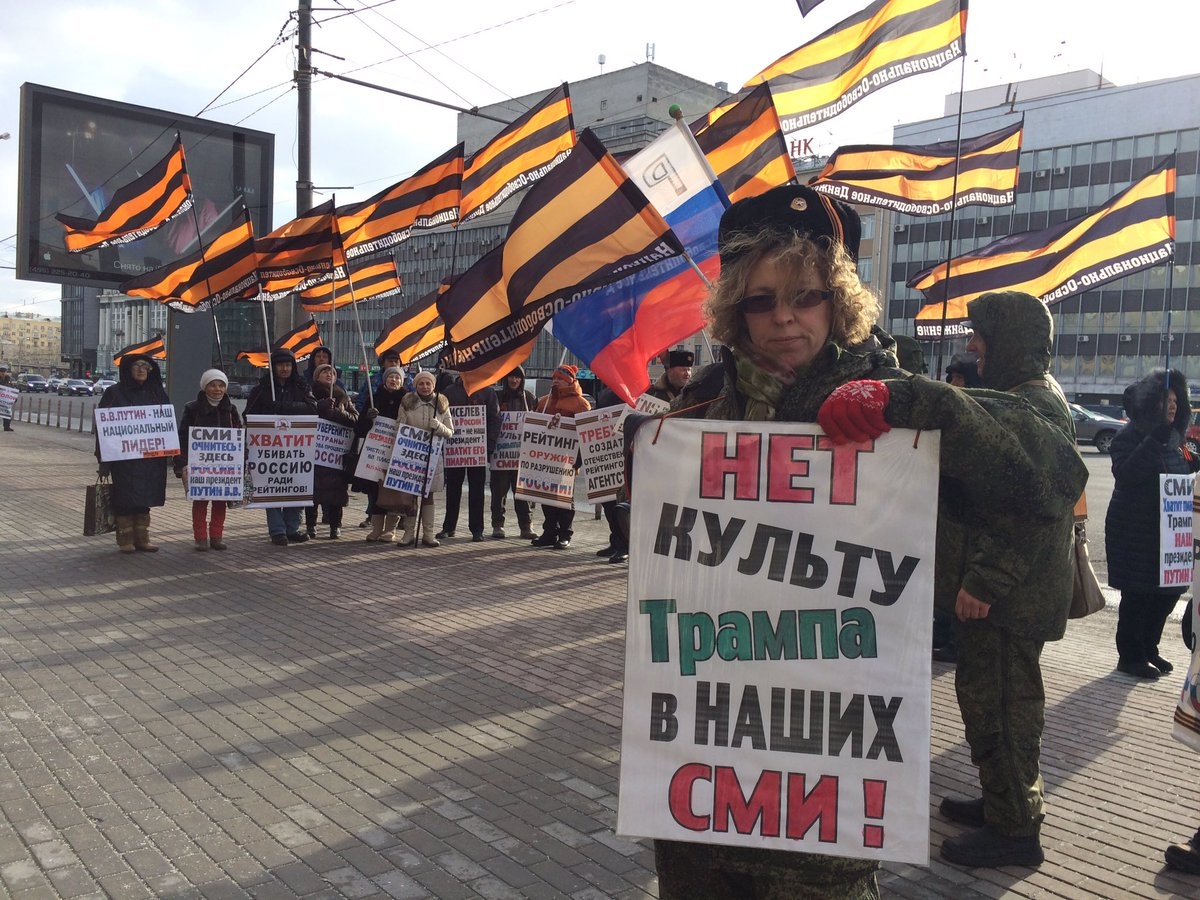 A Russian nationalist protester holding a sign: "No To Cult of Trump In Our Mass Media." February 2017 (Image: @_Borodulin)