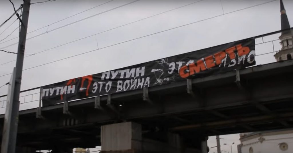 "Putin is War Putin is Death" banner (Image: video capture)