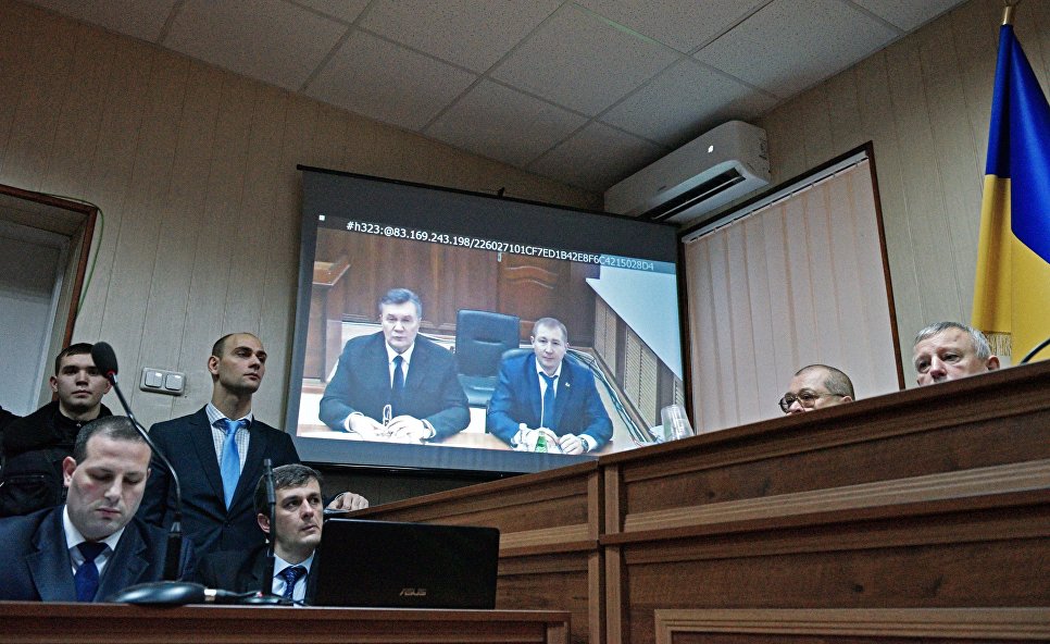 Ukrainian ex-President Yanukovych testified on the monitor in the Sviatoshyn district court of Kyiv via a video broadcast. Photo: https://cont.ws
