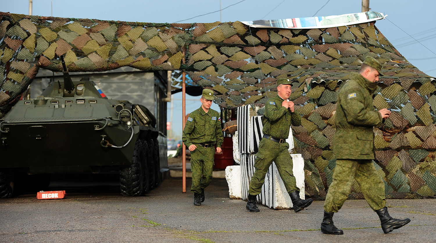 Russian soldiers and a tank stationed near the city of Bender, the "capitol" of the unrecognized Pridnestrovian Moldavian Republic in Moldova bordering Ukraine.