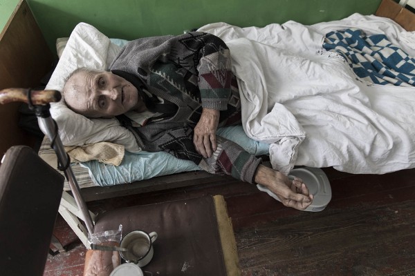 An elderly man remains in a retirement home without care from family.