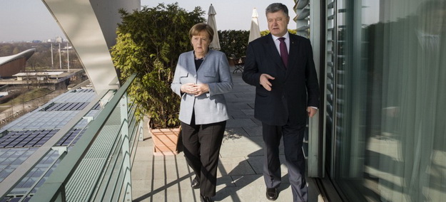 https://www.eurointegration.com.ua/images/doc/7/9/79c2ba1-mercel-poroshenko-625.jpg