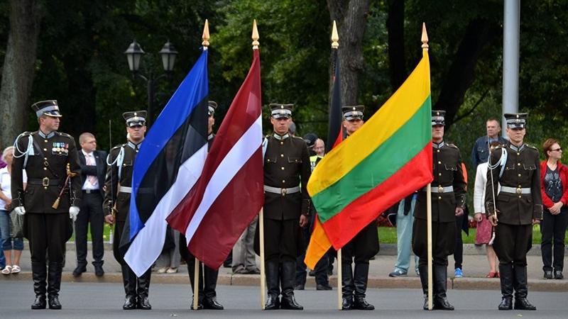 Military with state flag of the Baltic states: Estonia, Latvia and Lithuania