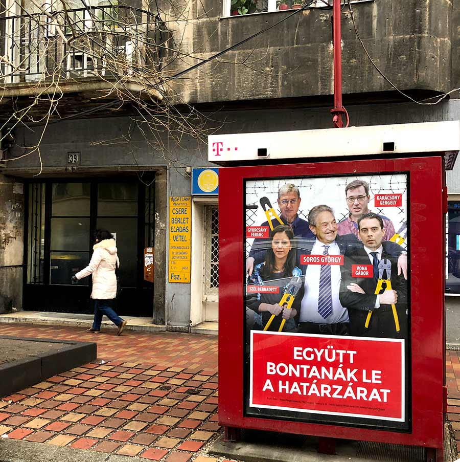 “They would tear down the fence together.” Campaign billboard in Budapest with opposition leaders and Hungarian-American philanthropist George Soros. Credit: Zselyke Csaky, FREEDOM HOUSE. ~