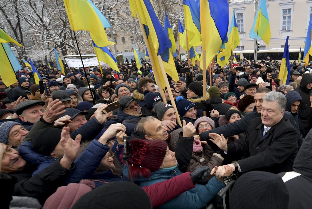 President Poroshenko reaches out to Ukrainians gathered outside the St. Sophia Cathedral, waiting for the Council to begin. For many Ukrainians, the Council was a true holiday. Photo: president.gov.ua ~
