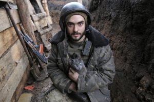 Vitaly “Hans”, 22 years old, from Zaporizhzhia. Deployed near Zholobok, Luhansk Oblast, January 18, 2020. Vitaliy was 16 when the war started. He called repeatedly at the military recruitment and enlistment bureau, but was always refused. They didn’t accept him in the volunteer battalions either. When he turned 18, he signed a five-year contract and is still fighting today. He says that he joined the army to defend the Motherland. ~